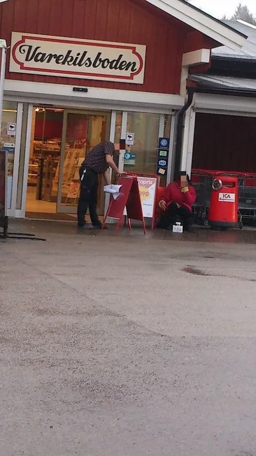 Beggar outside ICA in sweden